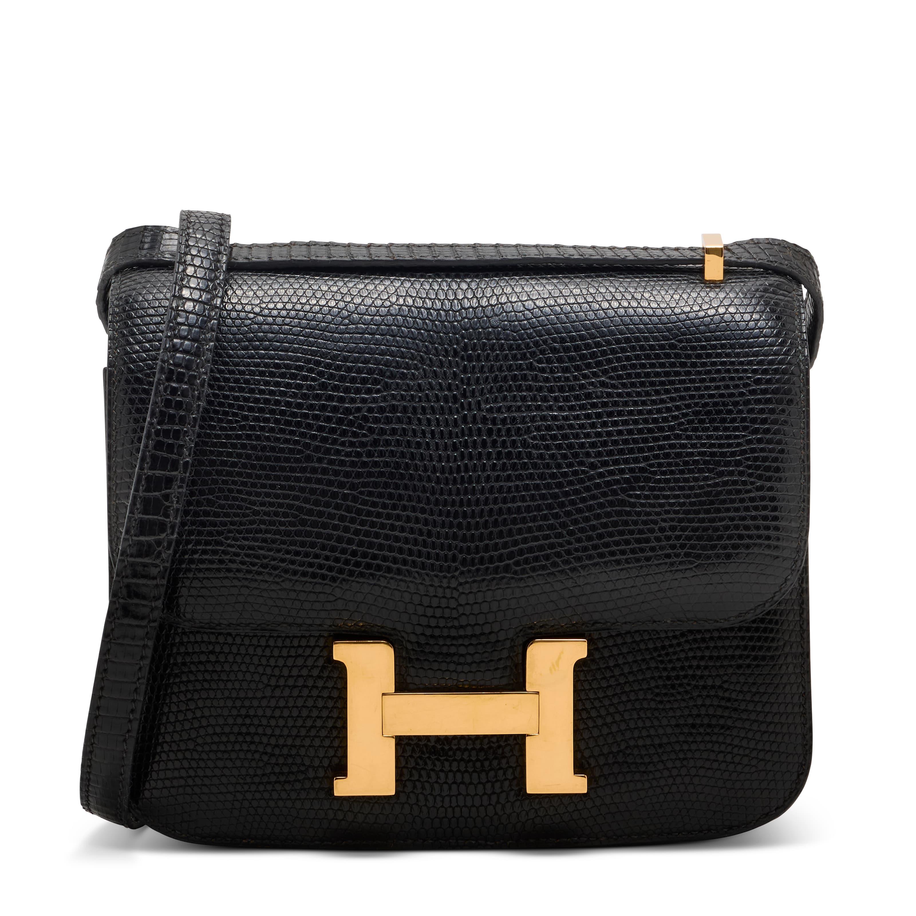 A SHINY BLACK SALVATOR LIZARD MINI CONSTANCE WITH GOLD HARDWARE HERMES, 1990s