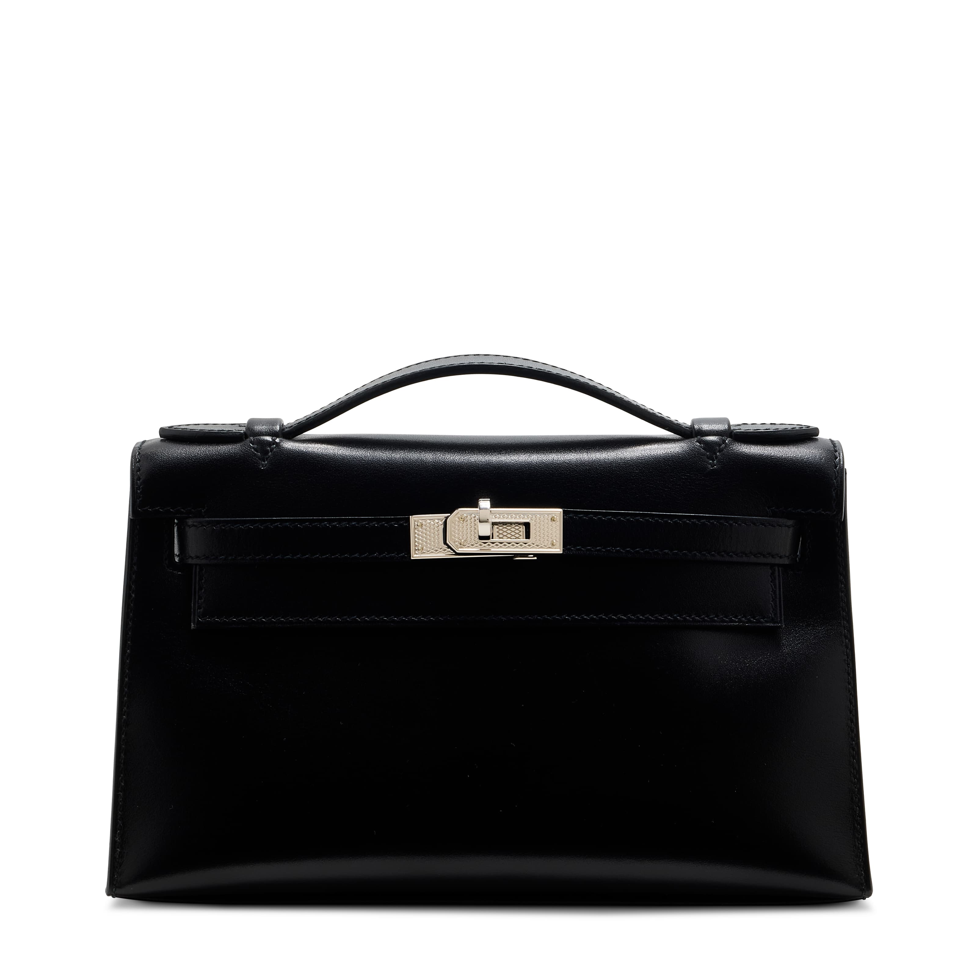 A LIMITED EDITION BLACK CALF BOX LEATHER KELLY POCHETTE WITH GUILLOCHE PALLADIUM HARDWARE HERMES, 2014